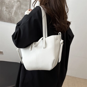 White litchi pattern bucket bag with side knot detail for women commute and casual use