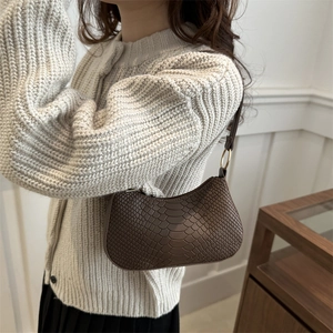Deep brown snake pattern crescent shoulder bag with golden metal ring and vintage texture