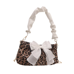 Trendy leopard print baguette bag with white bow and pleated cloud handle for women