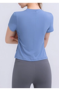 Back view of a sky blue cropped sports t-shirt with adjustable side drawstrings detail