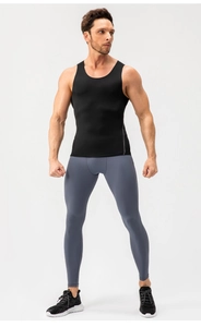 Full-body shot of professional men's compression vest and grey athletic leggings