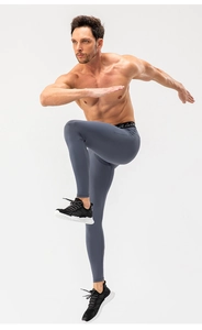 Detail of high-elastic men's compression pants waistband with professional athletic logo