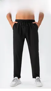 Detail of men's black sports pants with elastic drawstring waist and straight fit