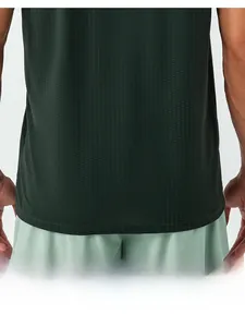 Close-up of breathable dark green honeycomb mesh fabric on men's quick-dry sports top