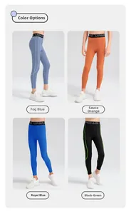 Detail view of boys' compression sports pants showing multiple colors and elastic waistbands
