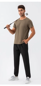 Close-up of lightweight breathable mesh fabric and elastic waistband on sports pants