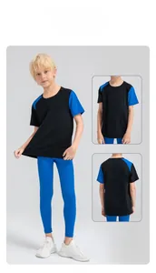 Detail view of boys elastic quick-dry compression pants with contrast color design