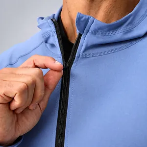 Detail view of smooth zipper and reinforced collar stitching on men sports jacket