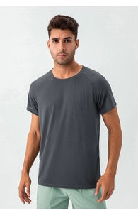 Close-up of dark grey men's sports t-shirt with breathable quick-dry mesh fabric detail
