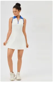 Close-up of the elegant lapel collar and zipper detail on the white tennis dress