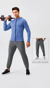 Detail showing breathable sky blue sports jacket and grey joggers for men training