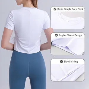 Women's white short sleeve yoga top with breathable fabric and side drawstring details