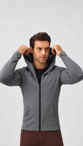 Detail of dark grey men's slim fit running jacket with zipper and kangaroo pocket