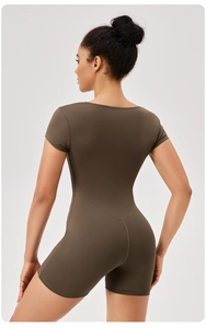 Rear view of a dark olive green yoga romper featuring a tight fit and premium matte texture