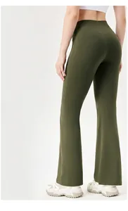 Rear view of olive green high waist yoga flare pants showcasing lifting and sculpting effect