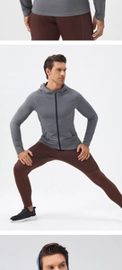 Detailed views of men's thermal sports jacket and flexible workout leggings for fitness