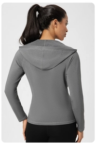 Vue arrière de la veste de yoga grise ajustée à capuche pour le fitness et la course