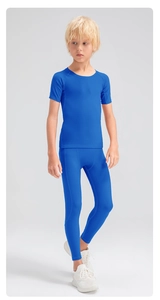 Boy's blue compression sports set with short sleeve t-shirt and high elastic leggings