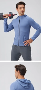 Men's blue zip-up sports jacket with hoodie, sleek fitness fabric and side pocket detail