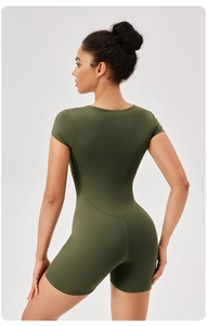 Rear view of slimming army green yoga romper showing ergonomic streamlined back design