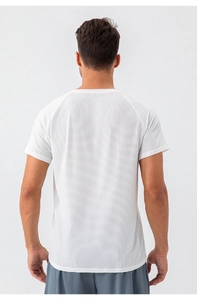 Close-up of breathable mesh texture on white quick-dry men's athletic t-shirt