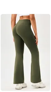 Detail of high waisted yoga flare pants in army green with a butt lifting back design