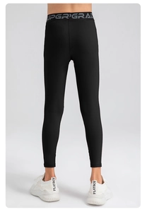 Détail du legging de sport pour garçon avec ceinture élastique UPGRADE
