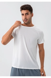 Detail showing the micro-hole breathable mesh texture of the men's white sports t-shirt