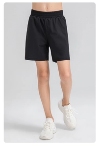 Détail du short de sport noir pour garçon avec tissu respirant et taille élastique