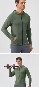 Detailed view of men's olive green zip-up sports jacket with breathable stretch fabric