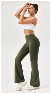 Detail of high waisted flared yoga pants in olive green showing body-shaping fit