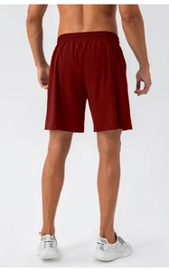 Rear view of men's burgundy quick-dry sports shorts with elastic waist and relaxed fit