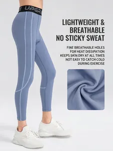 Boys' blue compression leggings with high-elastic fabric and breathable side stitching