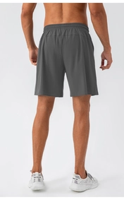 Detail view of quick-dry dark grey athletic shorts showing breathable fabric and drape