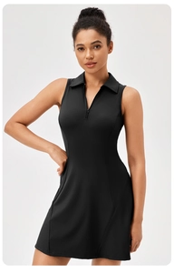 Detail of the black tennis dress featuring a zip-up polo collar and slim-fit waist design