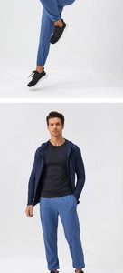 Detailed view of men's quick-dry sports jacket with zipper collar and athletic pants set