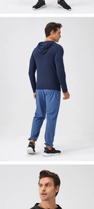 Detail view of the men's moisture-wicking sports tracksuit with hoodie and tapered pants