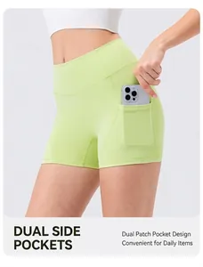 Detail view of high-waisted yoga shorts with functional side pockets in bright neon green