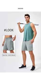 Detail view of quick-dry gray green sleeveless sports tank top and fitness shorts set
