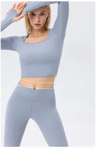 Detail of high waisted yoga pants with wide waistband for tummy control and lifting