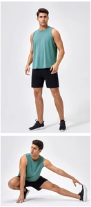 Detail view of breathable sage green gym tank top and black quick-dry athletic shorts