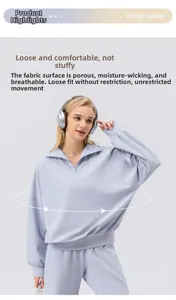 Detail of half-zip sweatshirt fabric showing breathable moisture-wicking texture