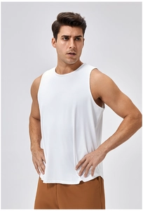 Close-up of white breathable sports tank top with side slit and curved hem detail