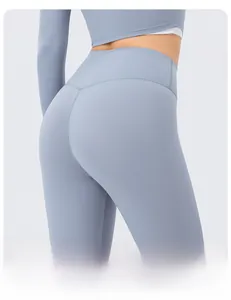 Close-up of high-waisted yoga pants with V-shaped back seam for butt-lifting effect