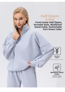 Detail of half-zip stand collar and high-quality zipper on purple knit sweatshirt