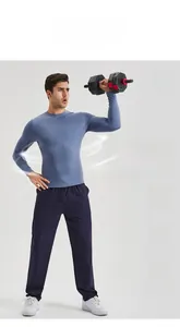 Men's blue quick-dry long sleeve fitness shirt featuring breathable side seams and elastic fabric