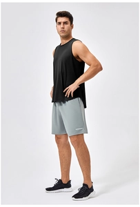 Close-up of men's quick-dry black tank top and grey shorts with reflective detail