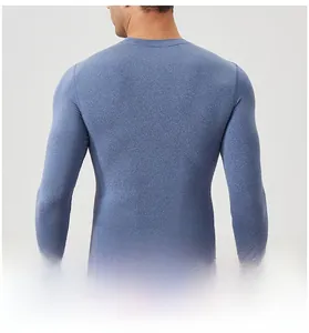 Detail of four-needle six-thread flatlock seams on men's blue compression sports top