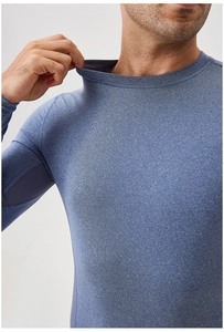 Detail of blue high-elastic sports top collar showing premium breathable fabric texture