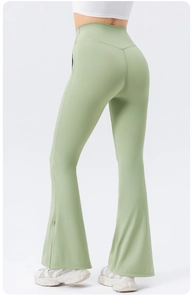 Rear view of high-waisted sage green yoga flare pants with V-seam for butt lifting effect